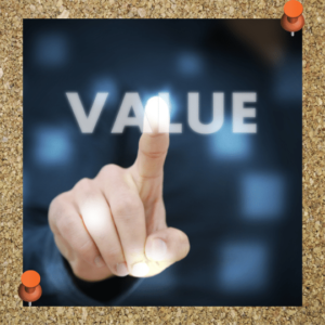 Valuing leadership is vital to overcoming leadership imposter syndrome. Photo shows a finger touching the word "value."