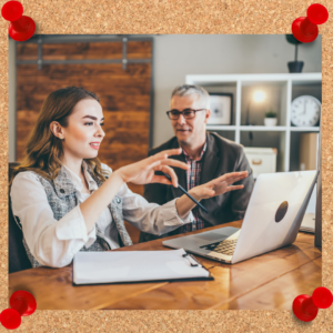 What is a mentor? Image depicts female and male communicating by a computer.