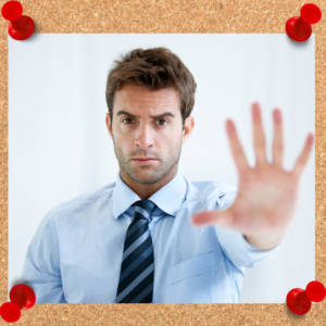 Leadership boundaries require the leader to set the precedent. The image shows a male employee holding his hand out in a "stop" motion.