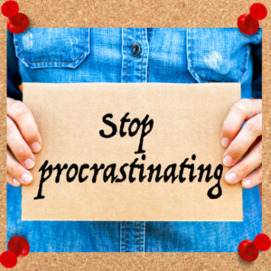 Image depicts individual holding a sign that states "stop procrastinating."